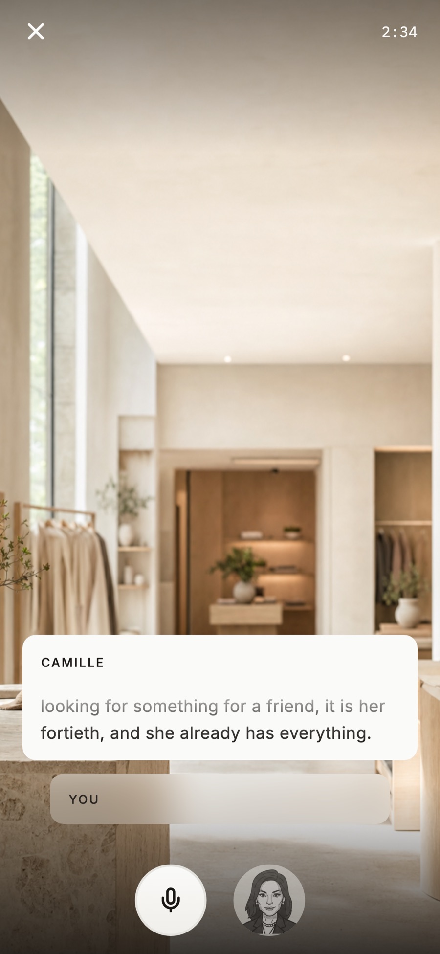 Live rehearsal screen in a boutique setting: a card headed CAMILLE reading "looking for something for a friend, it is her fortieth, and she already has everything", an empty YOU line, a microphone button and a 2:34 timer